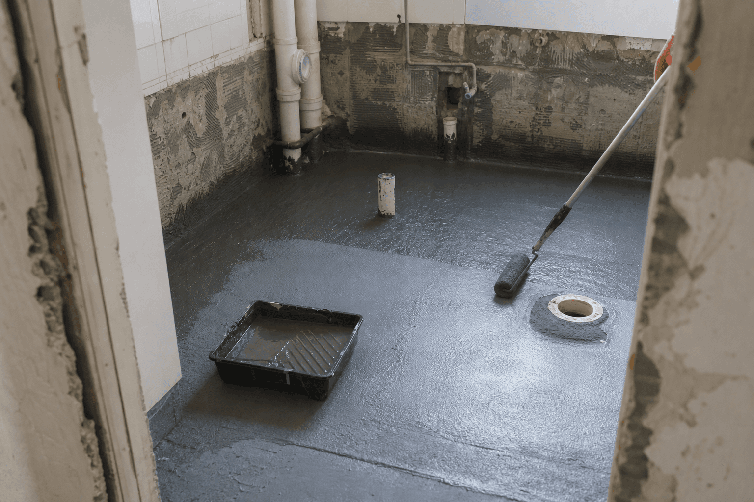 Bathroom waterproofing membrane being applied in a Singapore home
