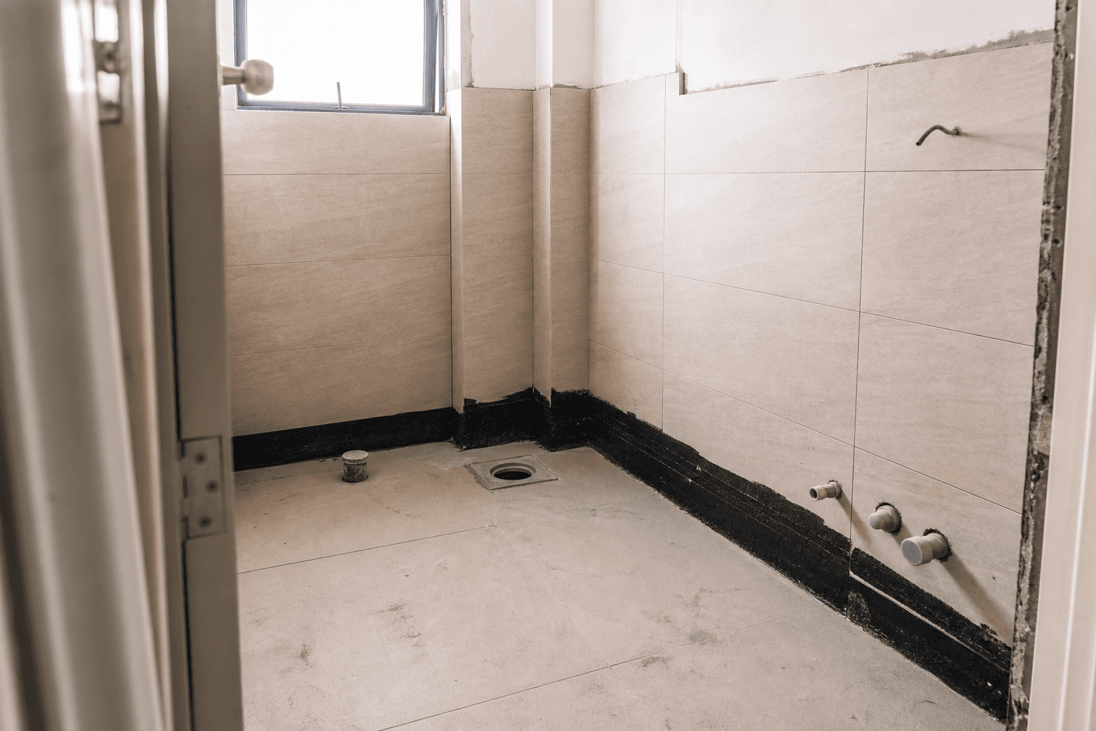 HDB toilet renovation with new tiling in Singapore